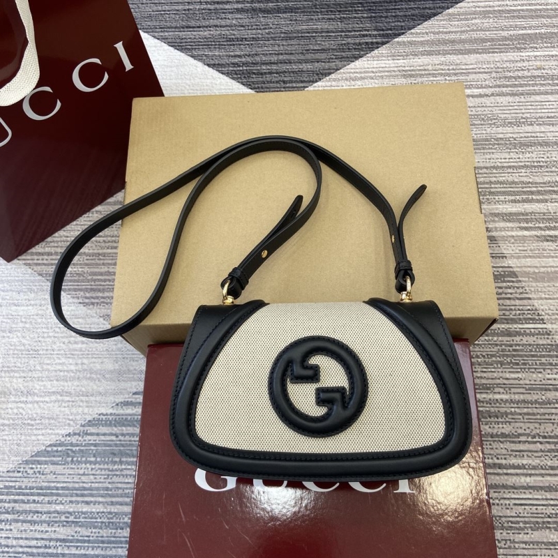 G*u*i satchel bags